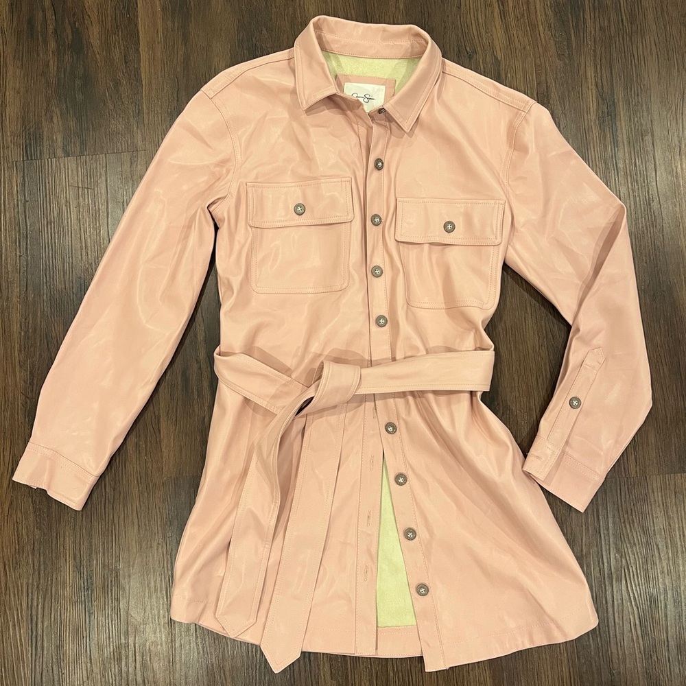 Jessica Simpson “Paula” Belt-Tie Faux Leather Jacket in Misty Rose